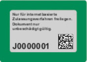 Amtliches Muster: grüner Aufkleber mit Druckstücknummer. Der Sicherheitscode ist noch verdeckt.